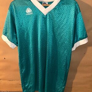 Campeā Teal and White Sports Jersey